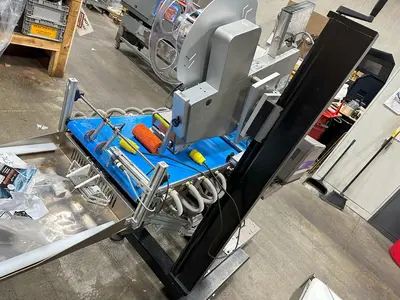 USED MFT 550 IP³ FEEDER AND LABELING SYSTEM
