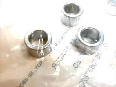 USED MIDWEST ACORN NUT UNTHREADED SPACERS