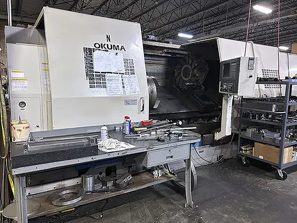 Used 1998 OKUMA LB-45 II CNC Lathes Illinois US | Machinery Marketing International #378966