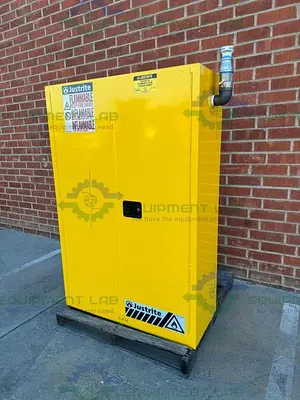 USED JUSTRITE 45 GALLON FLAMMABLE LIQUID STORAGE CABINET W/ SOFT CLOSE DOORS, KEY