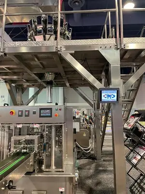 New Genesis Rotary Pre-Made Pouch Machine with 14-Head Scale