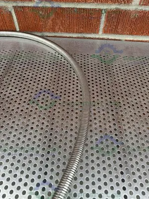 USED AIRGAS STAINLESS STEEL FLEXIBLE HOSE 75" W/ COMPRESSION FITTING, MALE THREADED