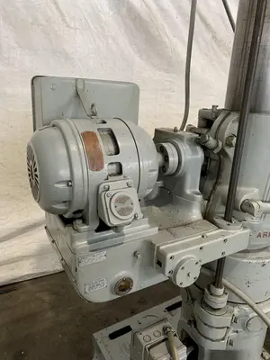4' X 11" CARLTON 1A RADIAL ARM DRILL. STOCK # 0850023.
