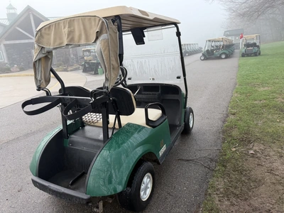 (1) 2017 E-Z-Go golf cart with a Kawasaki gas engine, model 625111G01, includes canopy, ball cover, ...