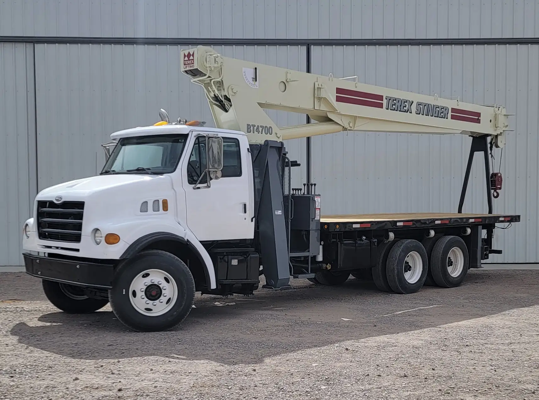 Sterling LT7500 Truck with Terex BT-4792 Crane