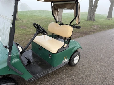 (1) 2017 E-Z-Go golf cart with a Kawasaki gas engine, model 625111G01, includes canopy, ball cover, ...