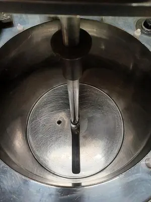 Citus jacketed mixing kettle and Alum-a-lift lifting cart