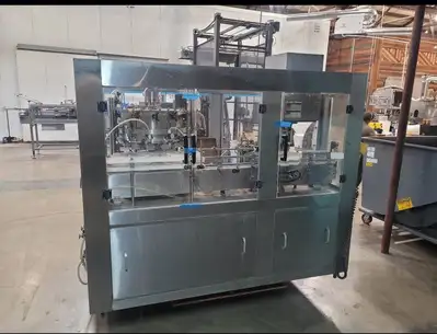 (Reduced!) Palmer 12-Head Rotary Isobaric Canning Line – 35 CPM