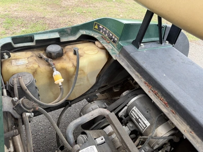 (1) 2015 E-Z-Go golf cart with a Kawasaki gas engine, does not include Club canopy, includes ball wa...