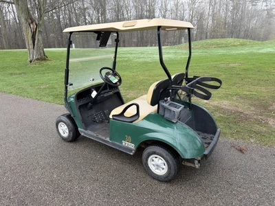 (1) 2015 E-Z-Go golf cart with a Kawasaki gas engine, does not include Club canopy, includes ball wa...