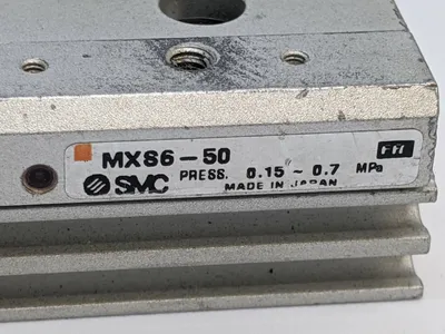 USED SMC DUAL ROD AIR SLIDE TABLE 6MM BORE, 50MM STROKE