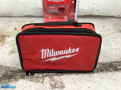 Lot of (1) Milwaukee M12 3/8” Right Angle Drill, (1) Milwaukee M12 1/4” Hex Impact Driver, and (1...