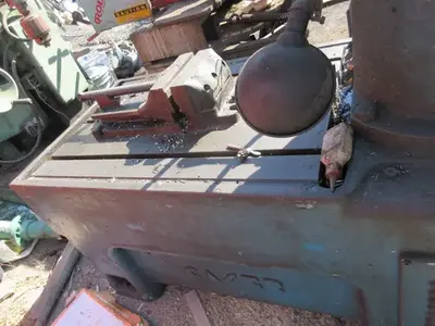 Caser, radial arm drill press