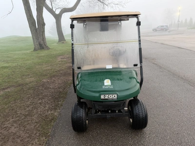 (1) 2015 E-Z-Go golf cart with a Kawasaki gas engine, includes canopy, ball cover, club cover, fold-...