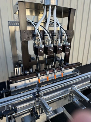 E-PAK 4-Valve Inline Bottle Filler with Conveyor