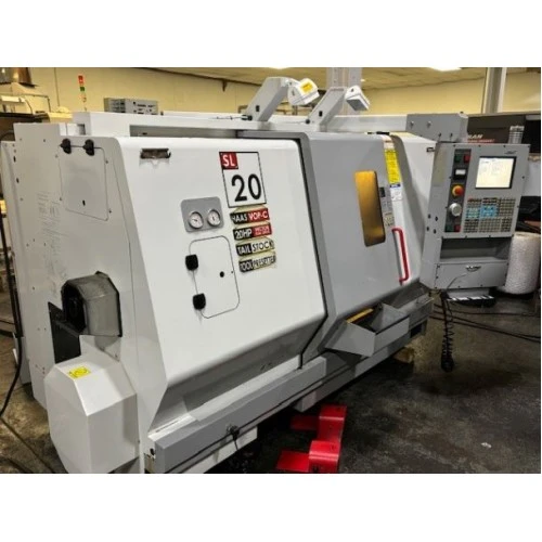HAAS SL20T CNC TURNING CENTER 20" SWING WITH 8" 3-JAW CHUCK, COLLET CHUCK, CHIP AUGER, 2004