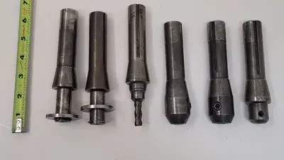 UNBRANDED R8 TOOL HOLDERS, SET OF 6, INCLUDING 1/4IN, 3/8IN, 1/2IN, AND 3/4IN SIZES.