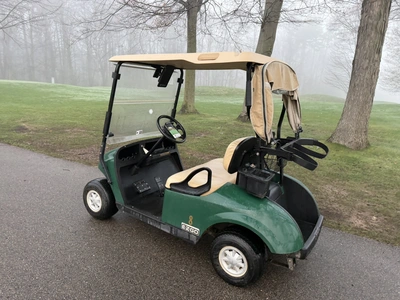 (1) 2015 E-Z-Go golf cart with a Kawasaki gas engine, includes canopy, ball cover, club cover, fold-...