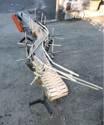 USED 11' STAINLESS STEEL  CONVEYOR 7" X 11' S CONVEYOR