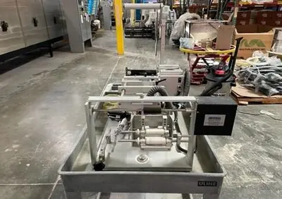 USED UNIVERSAL LABELING SYSTEMS R-310