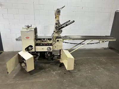 USED DOBOY PACKAGING MACHINERY INC MUSTANG