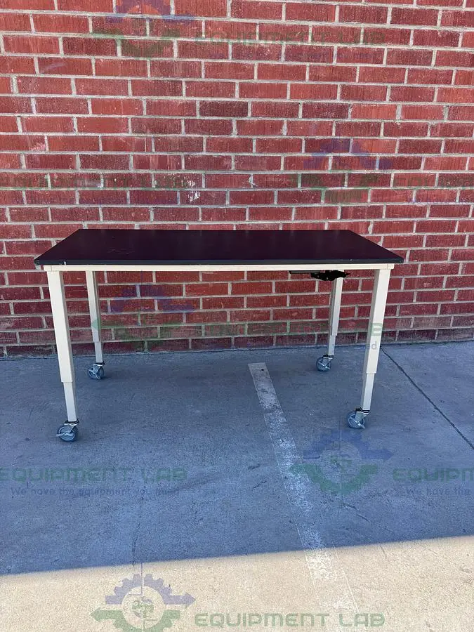 USED PHENOLIC / COMPOSITE RESIN ADJUSTABLE  SCIENCE TABLE WITH WHEELS-30" W X 62" L