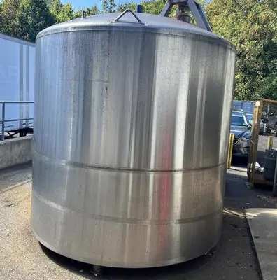 Used approximately 2400 gallon vertical stainless steel sanitary mix tank