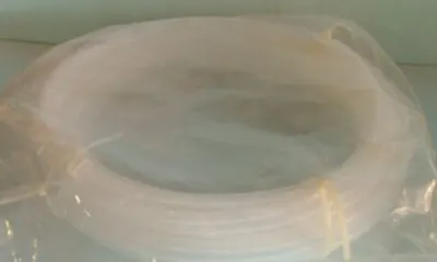 QTY. 1. TUBING CLEAR 100FT P/N AT500062-CH....