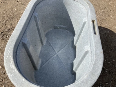 Behlen Country 100 gallon poly stock tank, approx 4’ x 2’ x 2’, drain valve on one end