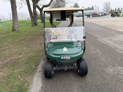 (1) 2015 E-Z-Go golf cart with a Kawasaki gas engine, includes ball washer and Club canopy, ball cov...