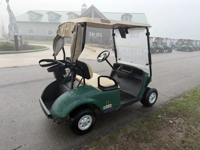 (1) 2015 E-Z-Go golf cart with a Kawasaki gas engine, includes canopy, ball cover, club cover, fold-...