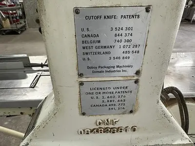 USED DOBOY PACKAGING MACHINERY INC MUSTANG