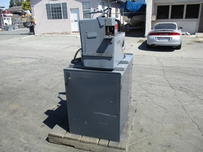 Struers / Discotom Metallurgical Saw with Coolant Pump
