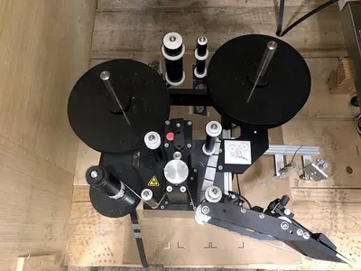 USED SOUTHERN CALIFORNIA PACKAGING CO. ST 1100 TUBE LABELER