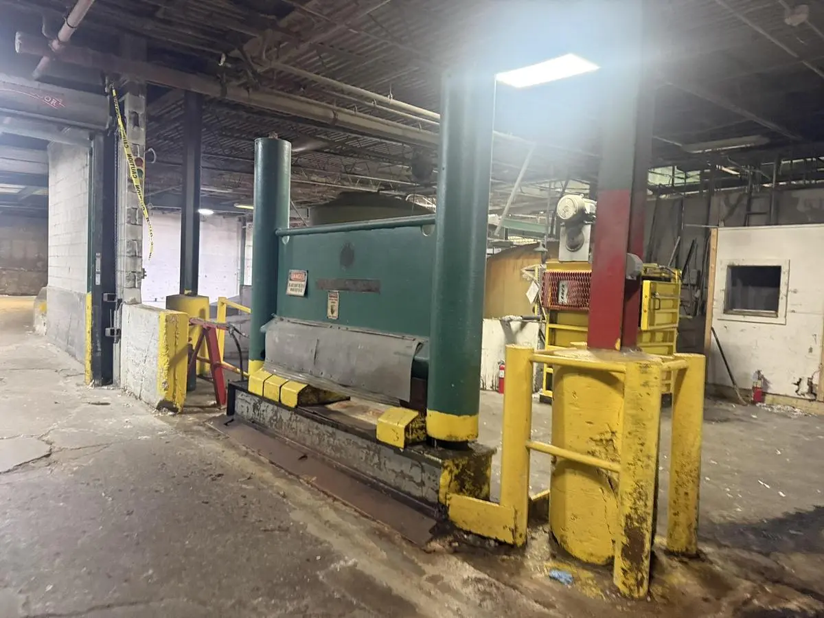 USED BLACK CLAWSON ROLL SPLITTER