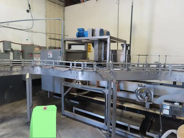 (1) Used Sentry Low Level Gripper style bottle rinser