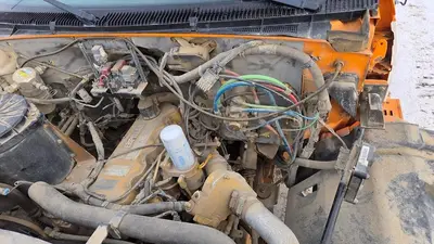 USED 2000 GMC C8500 TANDEM AXLE BED TRUCK