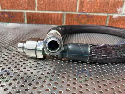 USED HUBER INSULATED CHILLER HOSE 53" W/ 1" FEMALE THREADED TO 1" QUICK DISCONNECT