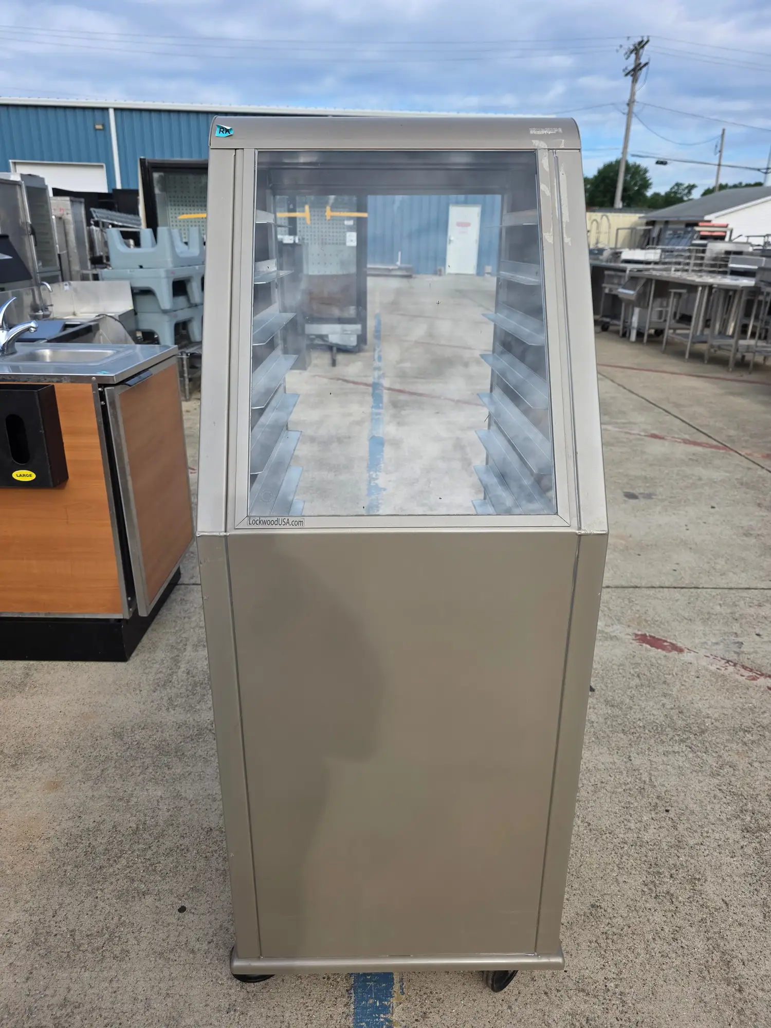 Used Lockwood Used Lockwood CA57-RR15-CD-S-L Mobile 15 Baking Sheet Enclosed Display - SS387 - RK Food Storage & Transportation Illinois US | Falcon Restaurant Supply #1373780