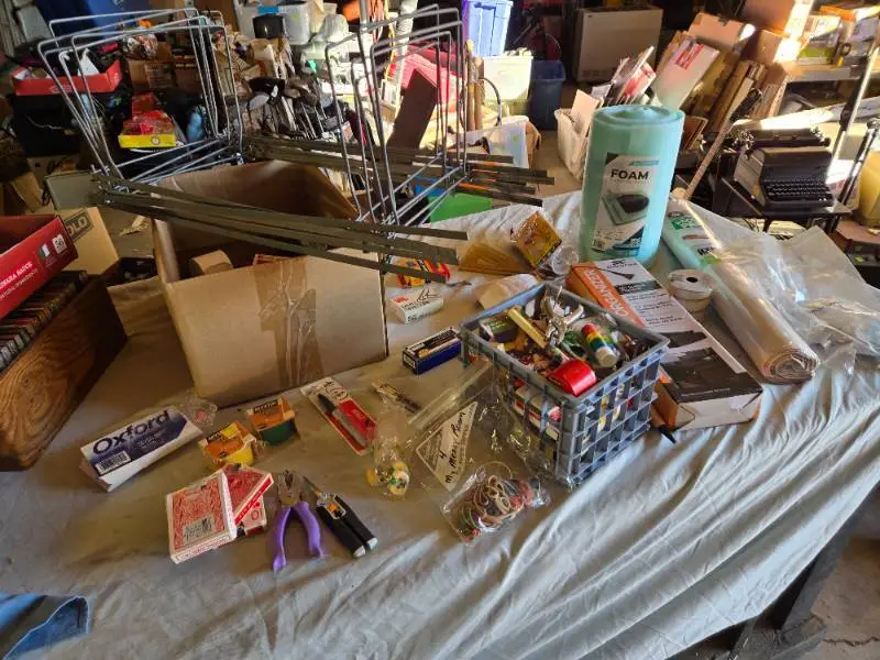 Assorted Office and Craft Supplies including Giant Pencil Decor, Cable Organizer, Glue Stic Foam Cushion Roll, and Miscellaneous Tools