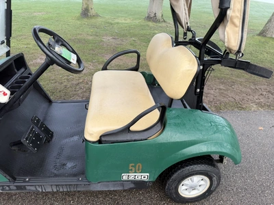 (1) 2017 E-Z-Go golf cart with a Kawasaki gas engine, model 625111G01, includes canopy, ball cover, ...