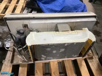 Wall Heater make and model unknown with slight exterior damage