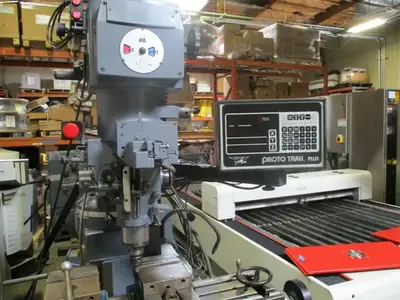 Lagun, CNC Mill, 10" x 50" table, 70-4200 RPM, 230 V, 3 HP, 3 axis, Prototrak, power draw bar, tooling
