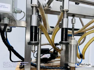 USED 2010 LIQUID PACKAGING 310-150 TT OVERFLOW FILLER
