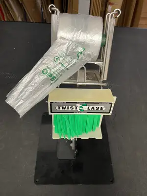Used Crown Poly Used Crown Poly Pull N Pak Produce Bag Dispenser with Twist Ease Tie Dispenser and Stand Bag Machine Accessories Illinois US | Falcon Restaurant Supply #1375806
