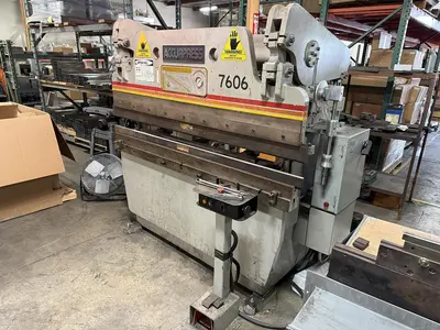 USED ACCURPRESS 7606
