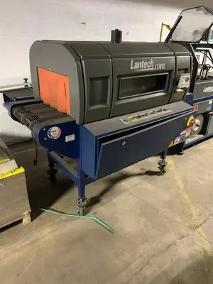 USED LANTECH SW-1000 INTERMITTENT MOTION  BELT FEED SIDE SEAL WRAPPER