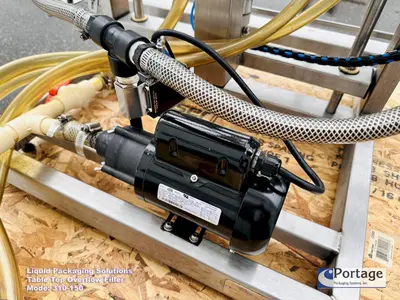 USED 2010 LIQUID PACKAGING 310-150 TT OVERFLOW FILLER