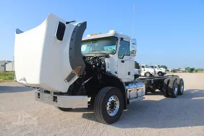 New | in-Stock 2026 MACK GRANITE 64BR Cab Chassis trucks Texas US | Roll Off Truck World #1491873