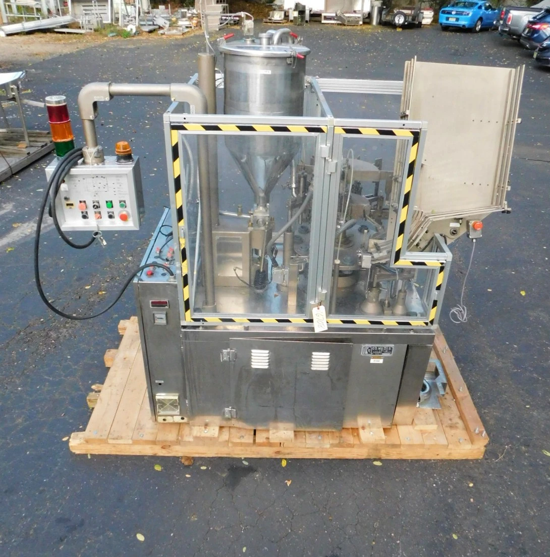 USED COMADIS METAL TUBE FILLER C 100 S